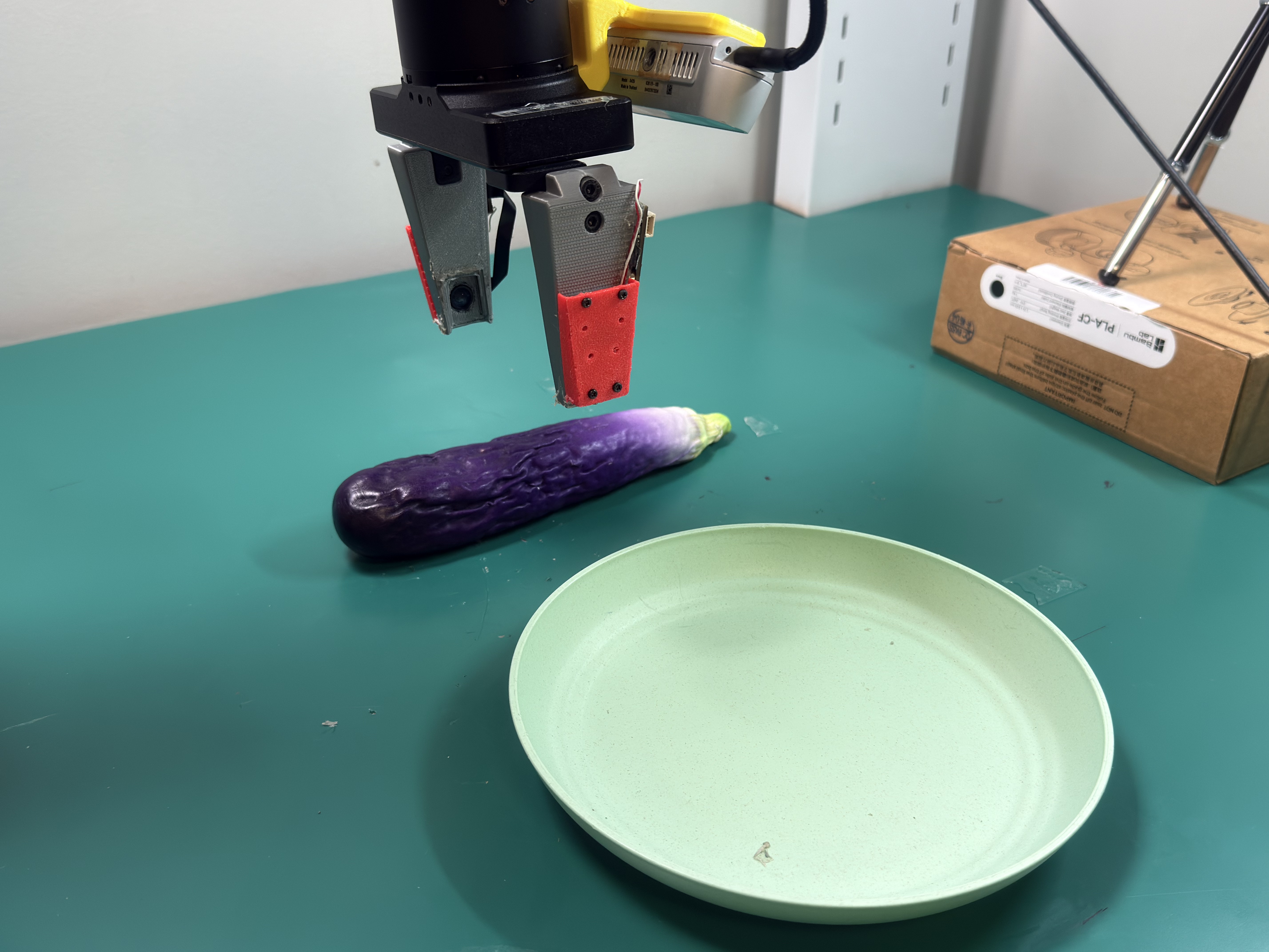 Robot grasping and placing an object into a target container.